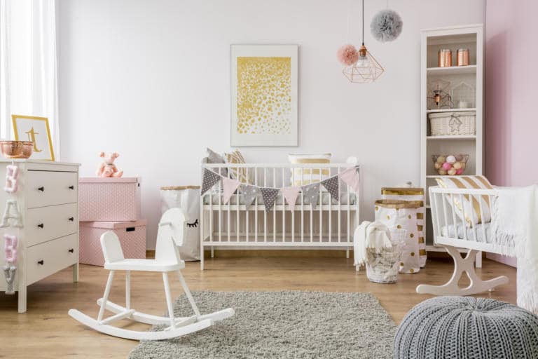 baby room with a grey artisan rug