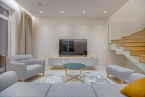 round opal coloured coffee table on light textured australian made rug